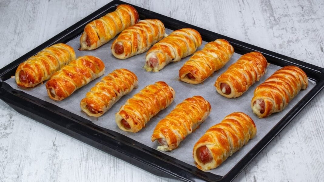 I cook sausages in puff pastry with cheese: a quick snack for the whole family. My favorite among baking